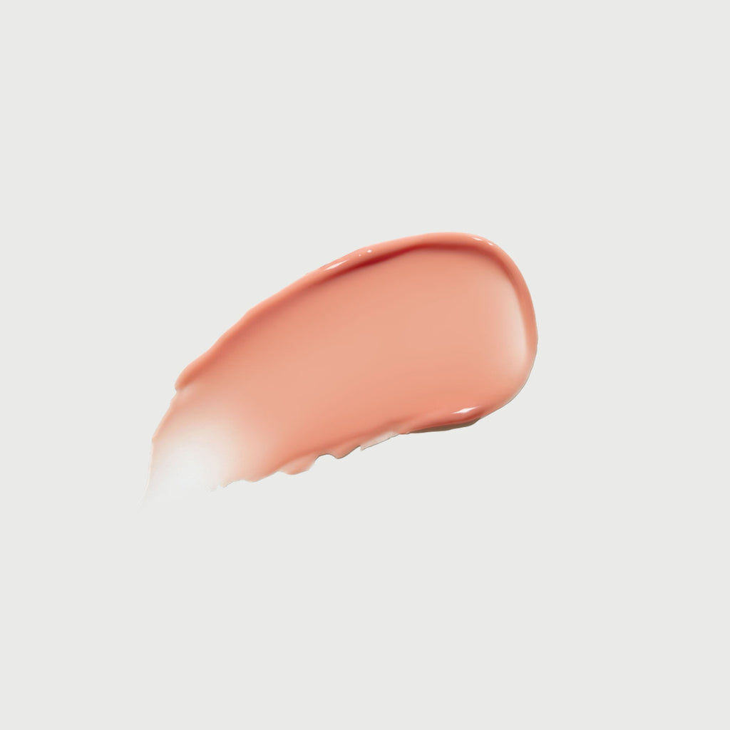 phyto-glow-lip-balm-peach-e0 NATR-10121-Swatch-Phyto-Glow-Peach-bonebkgd.jpg