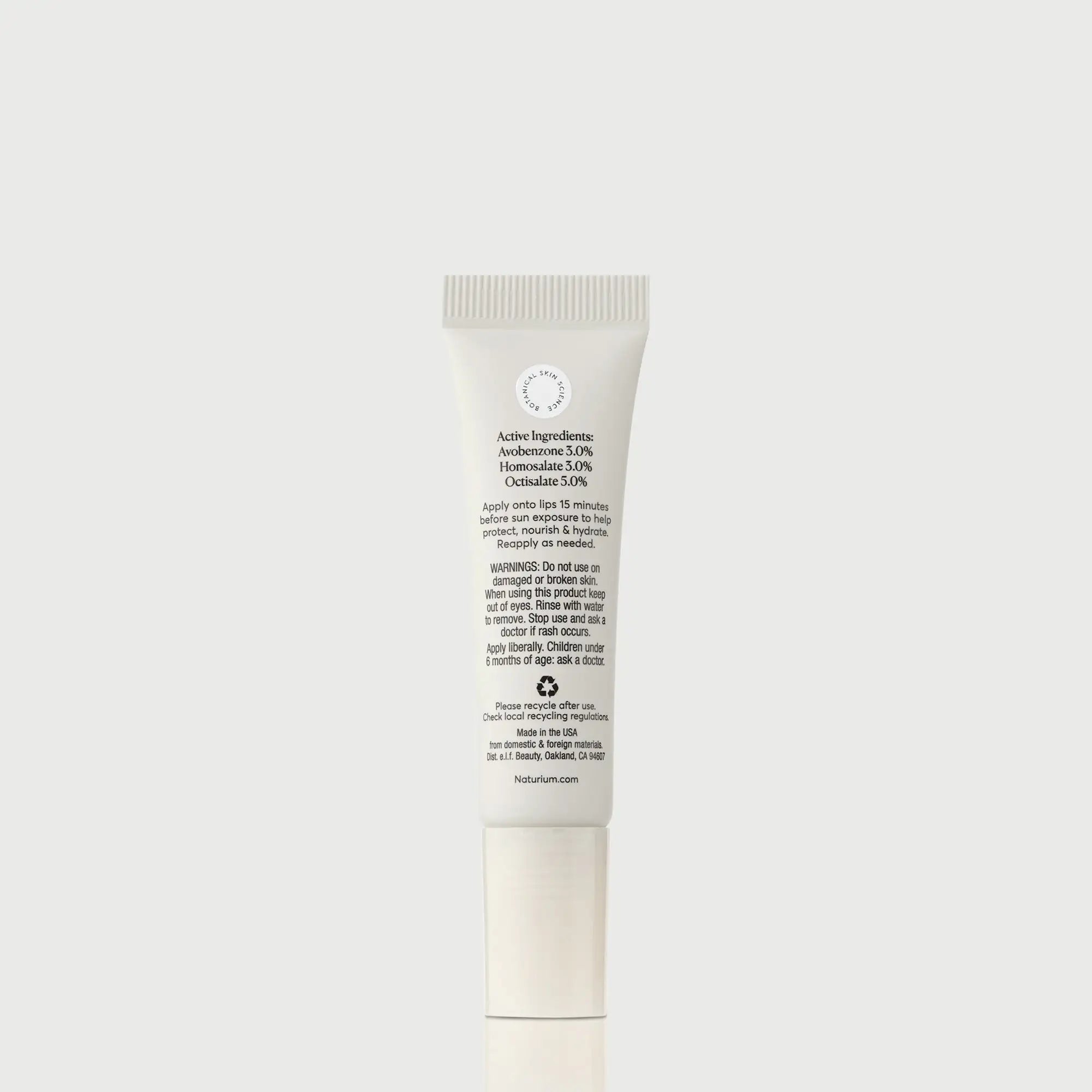 phyto-glow-lip-balm-spf-45-clear-l7 NATR-10124_PhytoGlow_SPF_Clear_primary_capon_back_bonebkgd_1.webp