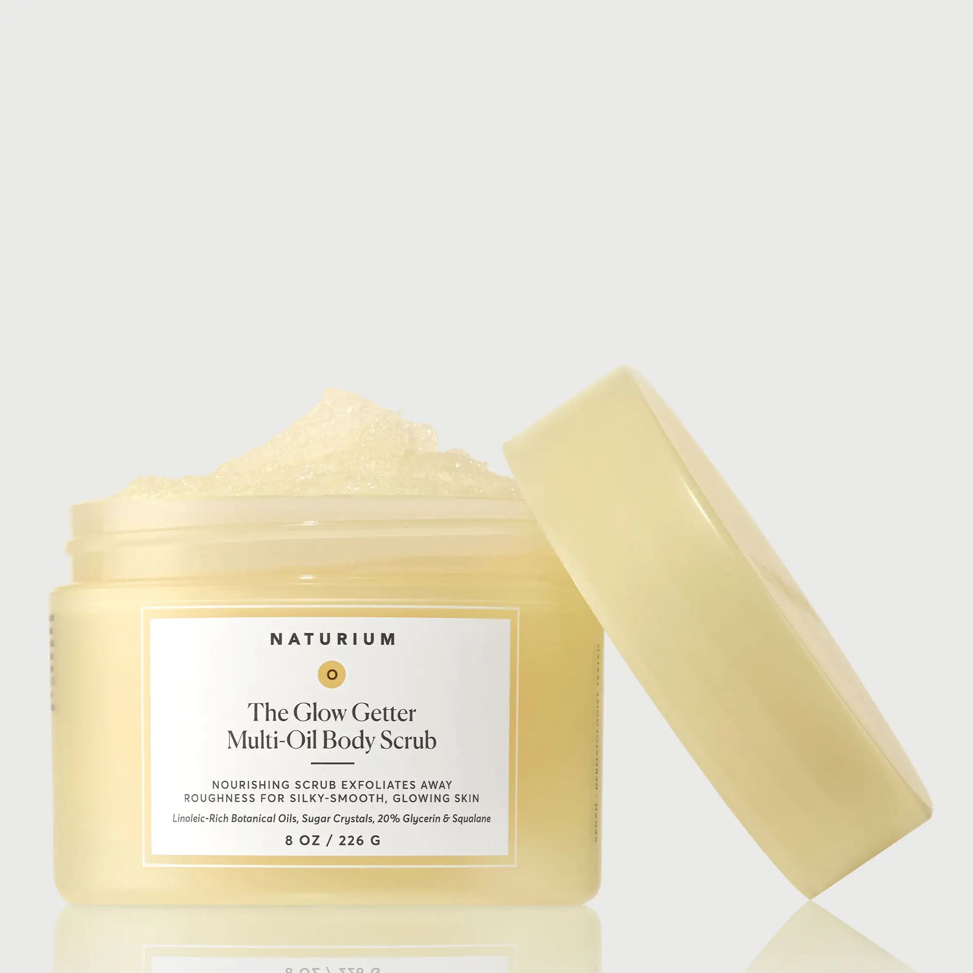 the-glow-getter-multi-oil-body-scrub-p7 NATR-40028-GlowGetter-Multi-Oil-Body-Scrub-Front-CapOff-bonebkgd.webp