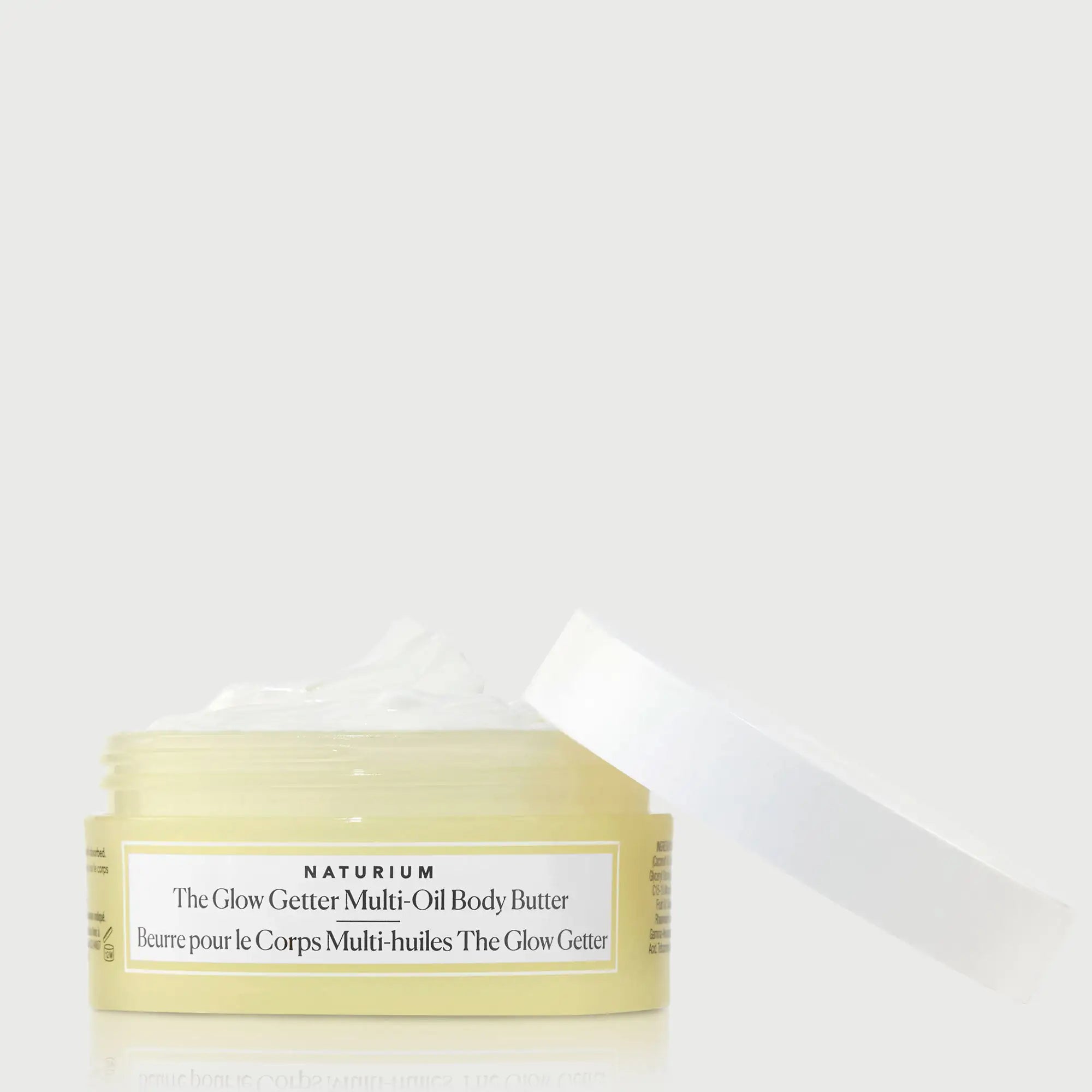 the-glow-getter-multi-oil-body-butter-travel-size-v5 NATR-40115_Glow-Getter-Body-Butter-Mini_front_capoff_bonebkgd.webp