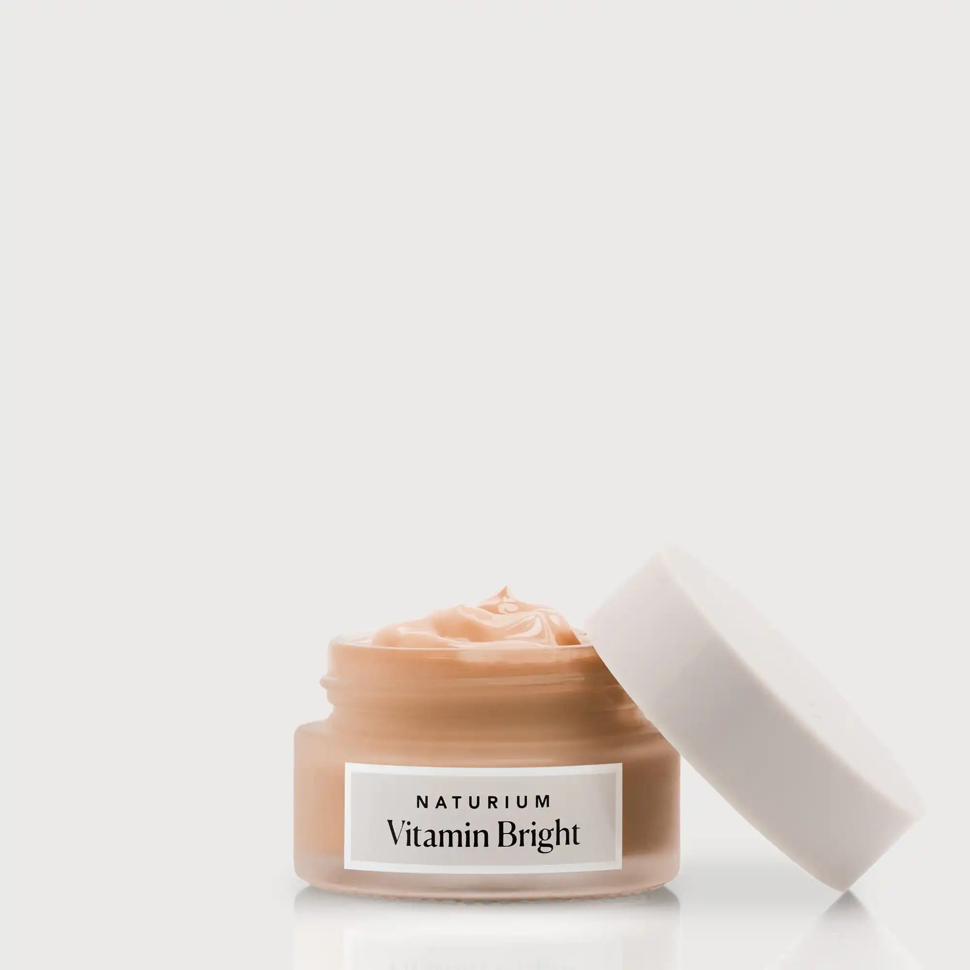 vitamin-bright-illuminating-eye-cream-l4 NATR-VitaminBright_DEEP_Primary_front_openjar_bone.webp