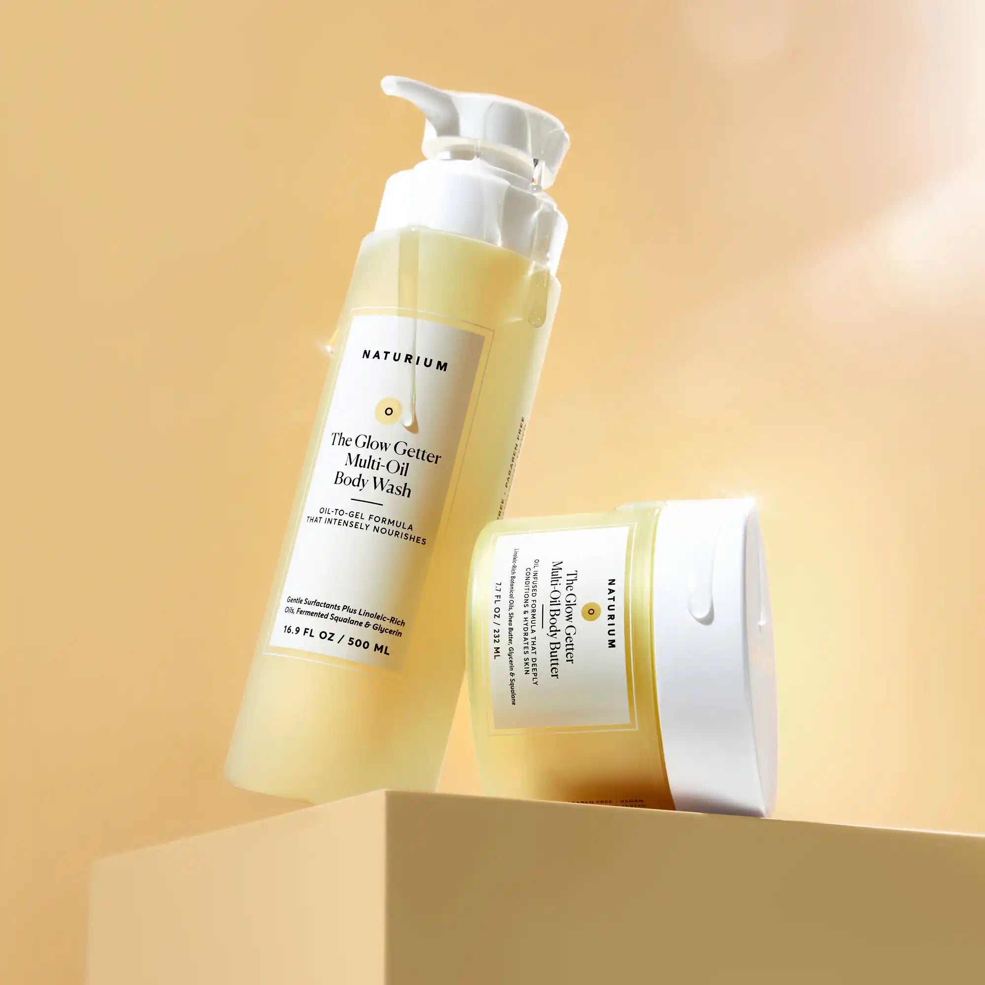 the-glow-all-out-body-bundle-a6 gg-bodybutter_1464-crop_revcolor_FL.webp